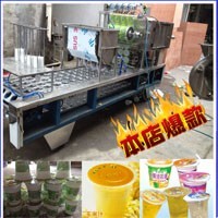 塑料杯裝豆?jié){灌裝封口機(jī) 豆?jié){包裝機(jī) 塑料杯包裝機(jī)圖片_高清圖_細(xì)節(jié)圖-溫州市甌海梧田進(jìn)誠(chéng)機(jī)械廠 -